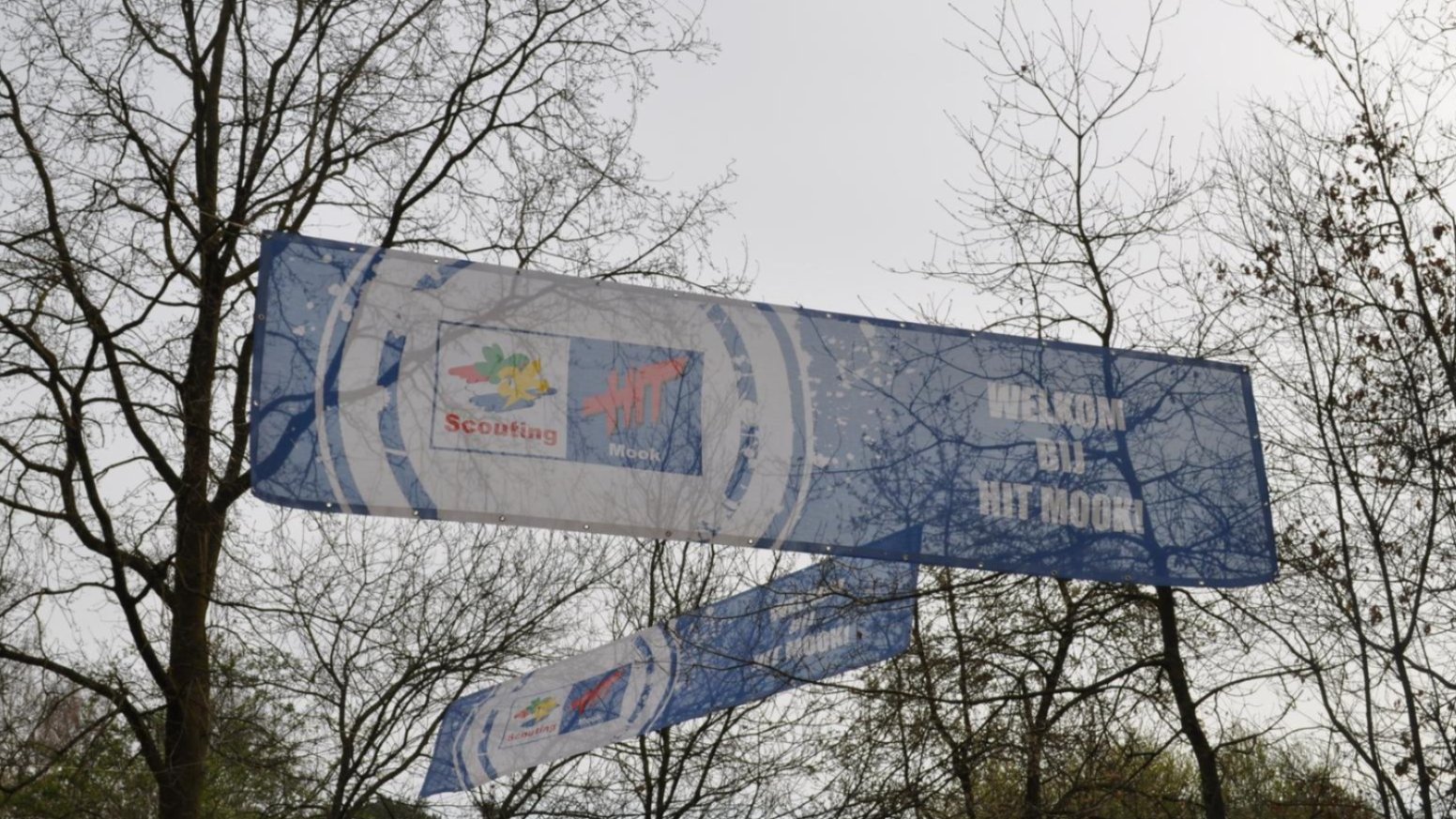 Header foto van vrijwilliger met HIT Mook das
